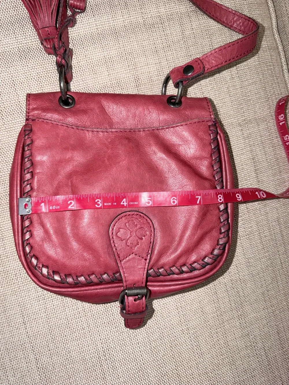 Patricia Nash Karis Leather Whipstitch Saddle Bag in a rich red/berry